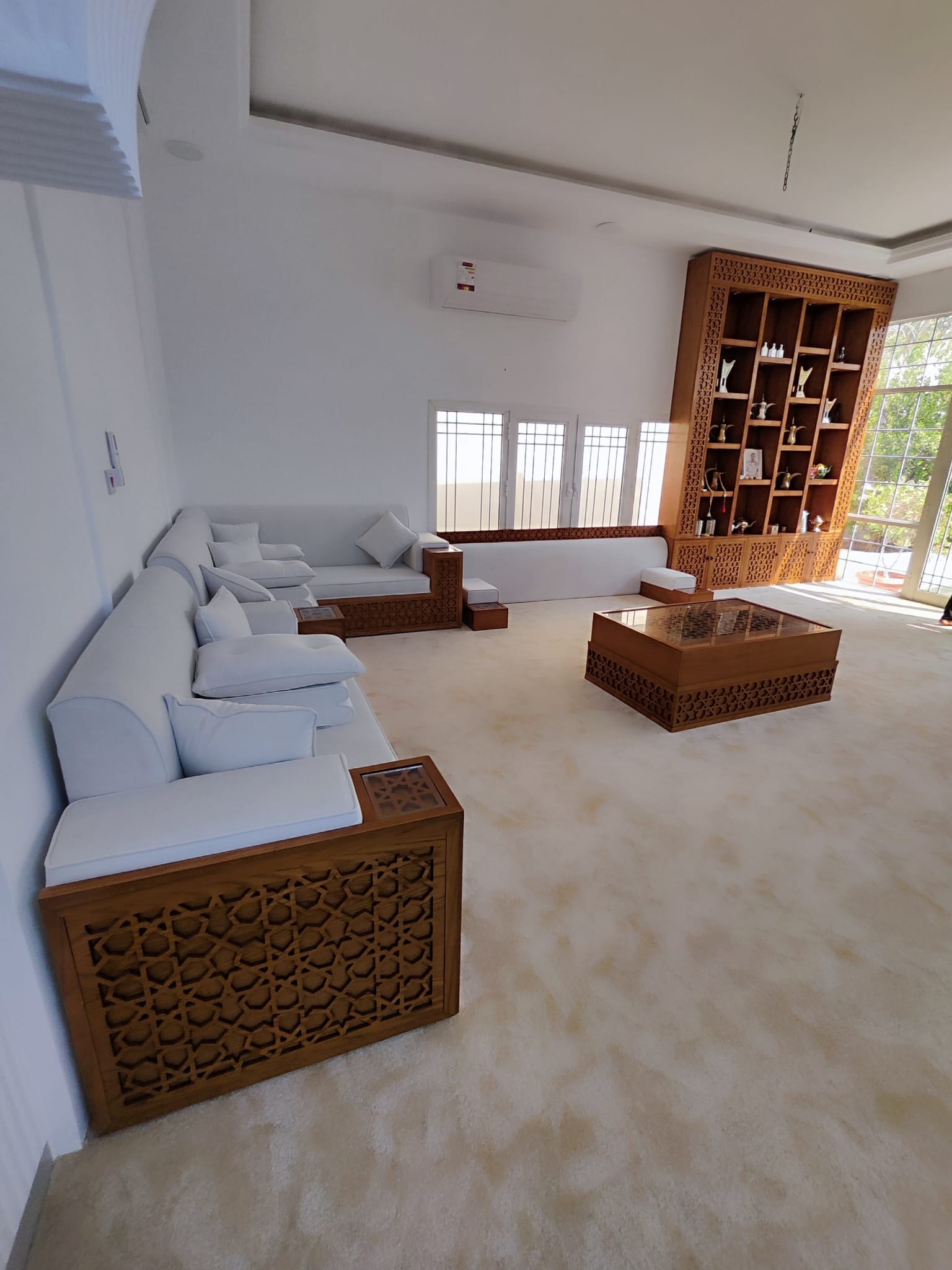 Majlis sofa and matching fitted cabinets in a Doha majlis (view 3)